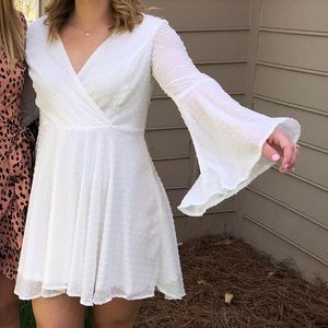 White bell sleeved cocktail dress